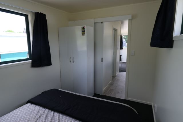 one bedroom 9 metre cabin - bedroom to lounge